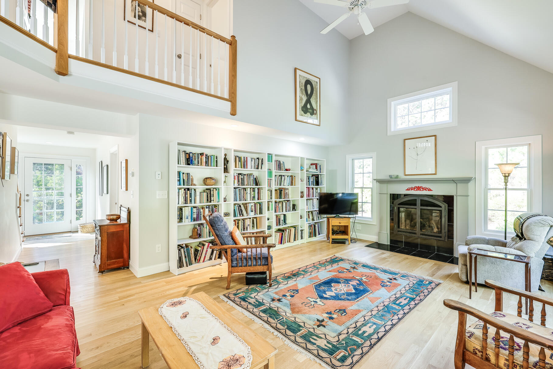 105 High Meadow Road Wellfleet, MA 02667 - Photo 38 of 52 a living room with fireplace furniture and a fireplace