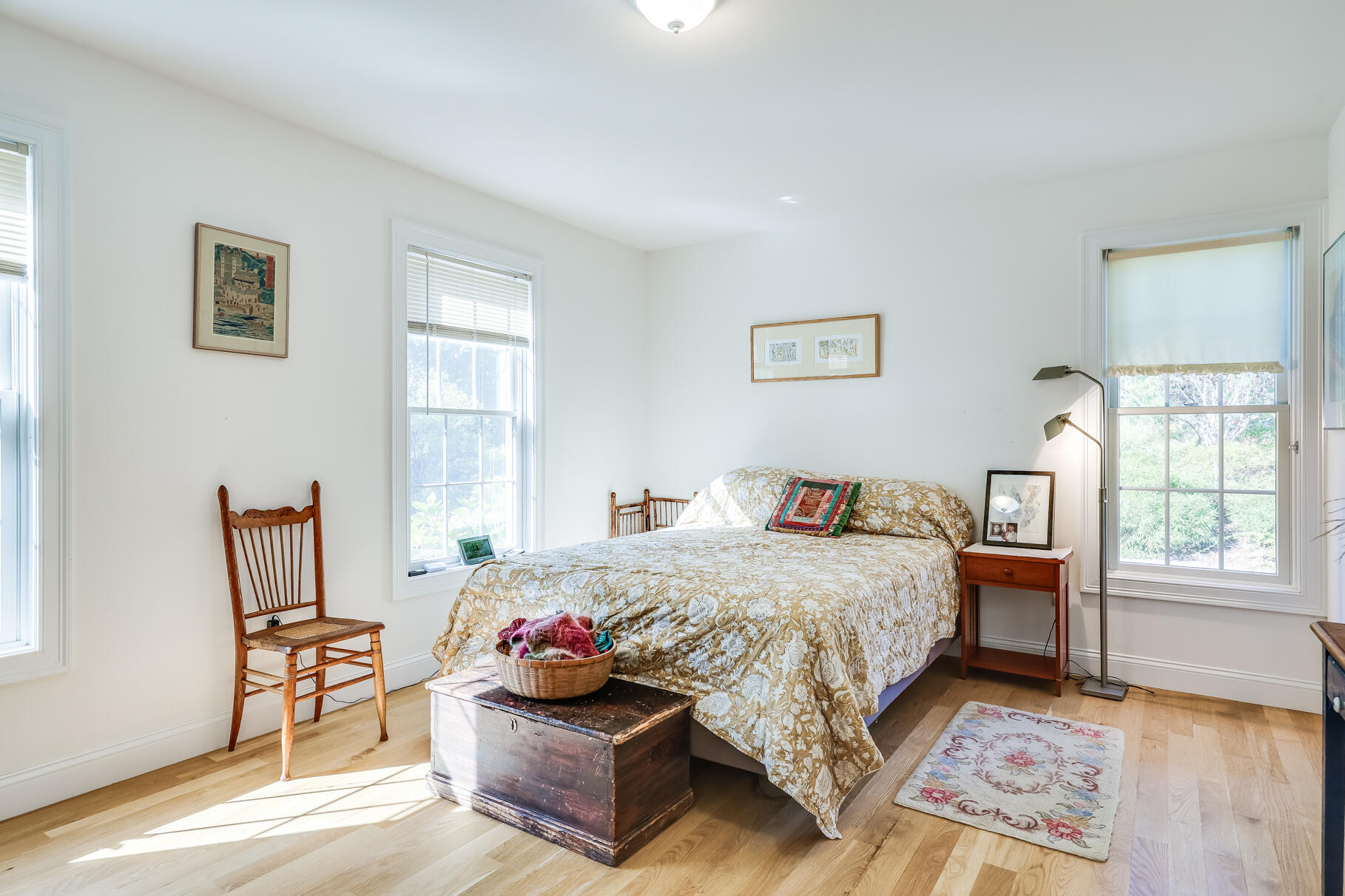 105 High Meadow Road Wellfleet, MA 02667 - Photo 42 of 52 a bedroom with a bed and wooden floor