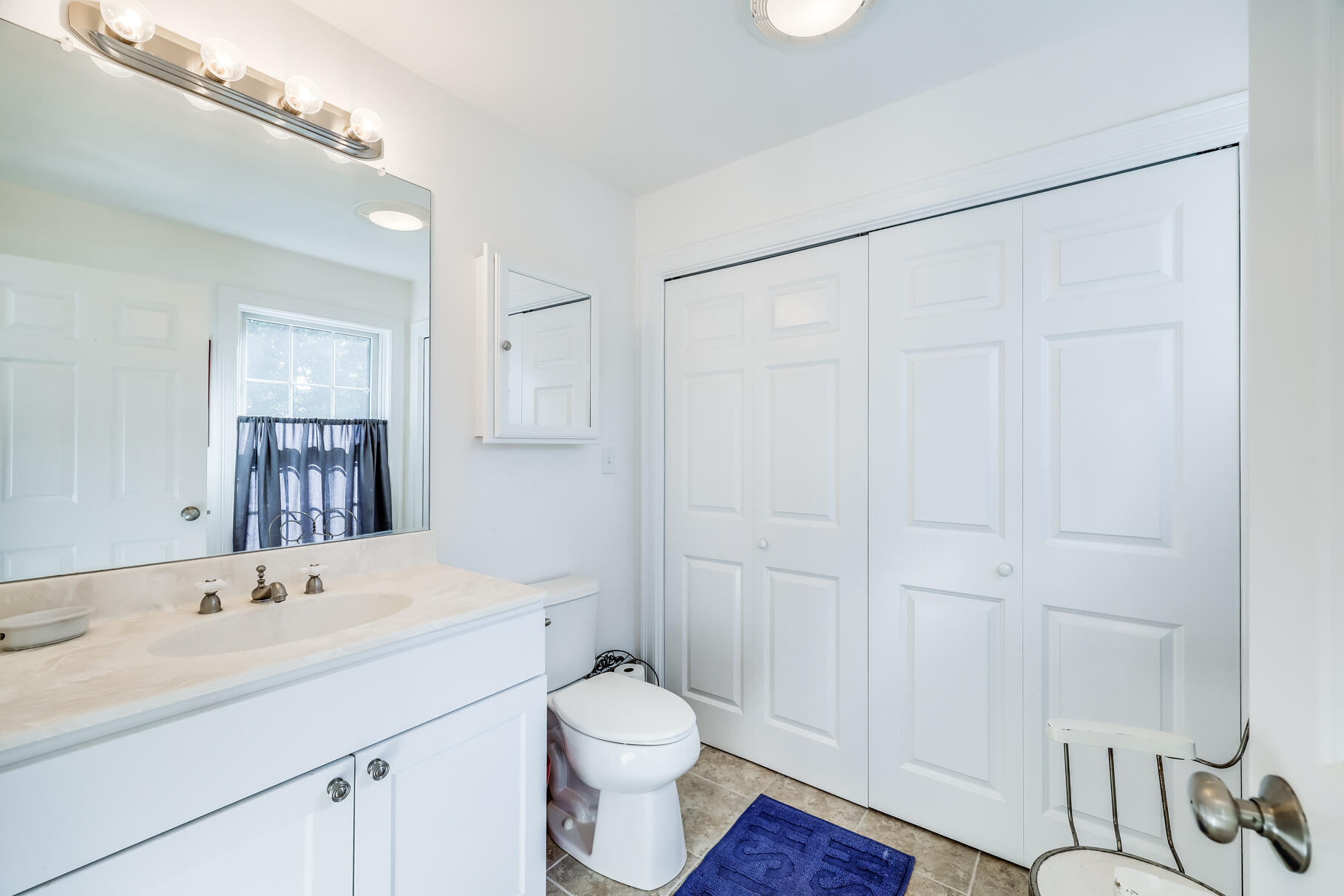 105 High Meadow Road Wellfleet, MA 02667 - Photo 45 of 52 a bathroom with a sink a toilet and shower
