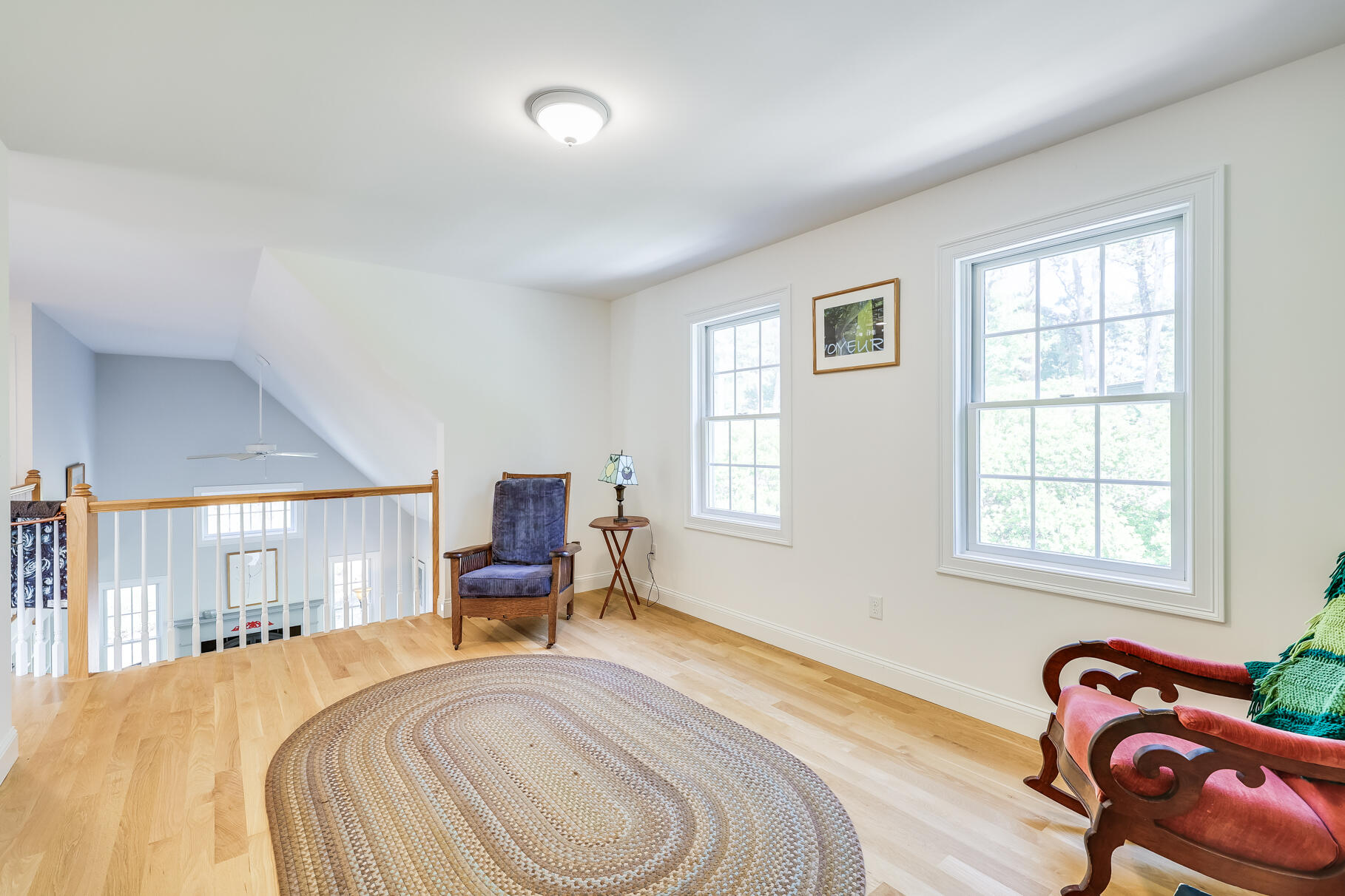105 High Meadow Road Wellfleet, MA 02667 - Photo 48 of 52 a bedroom with a bed and wooden floor