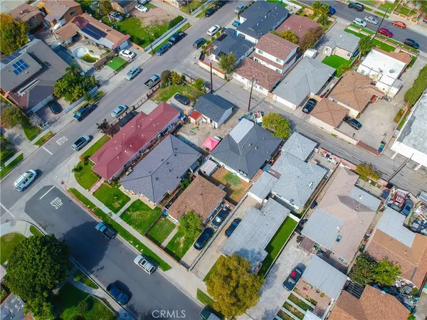 an aerial view of a house with a garden