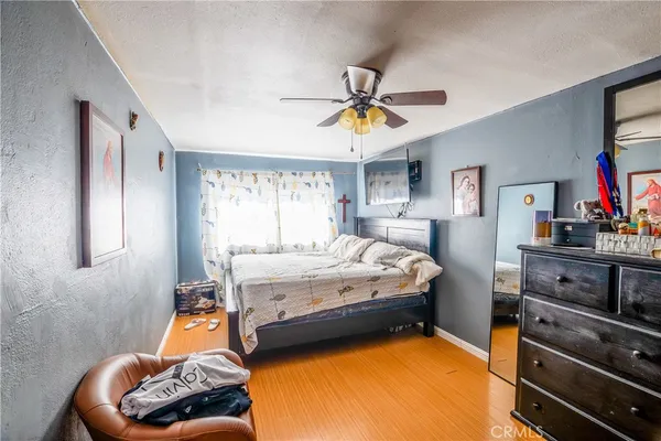 a bedroom with a bed and furniture