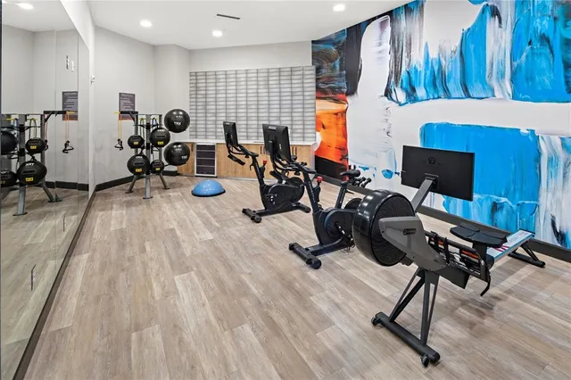 a view of a room with gym equipment