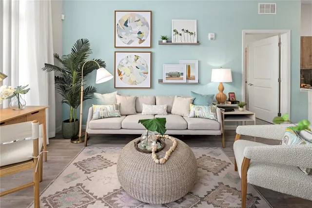 a living room with furniture and a couch