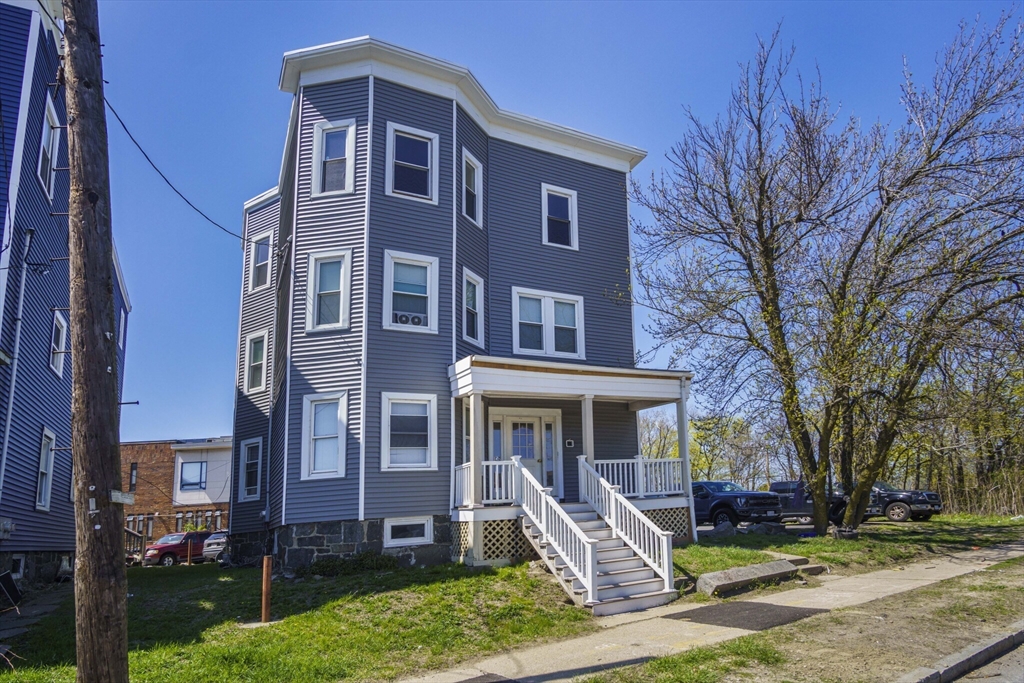 400-412 Neponset Avenue Boston, MA 02122 - Photo 11 of 31 a front view of a house with a yard