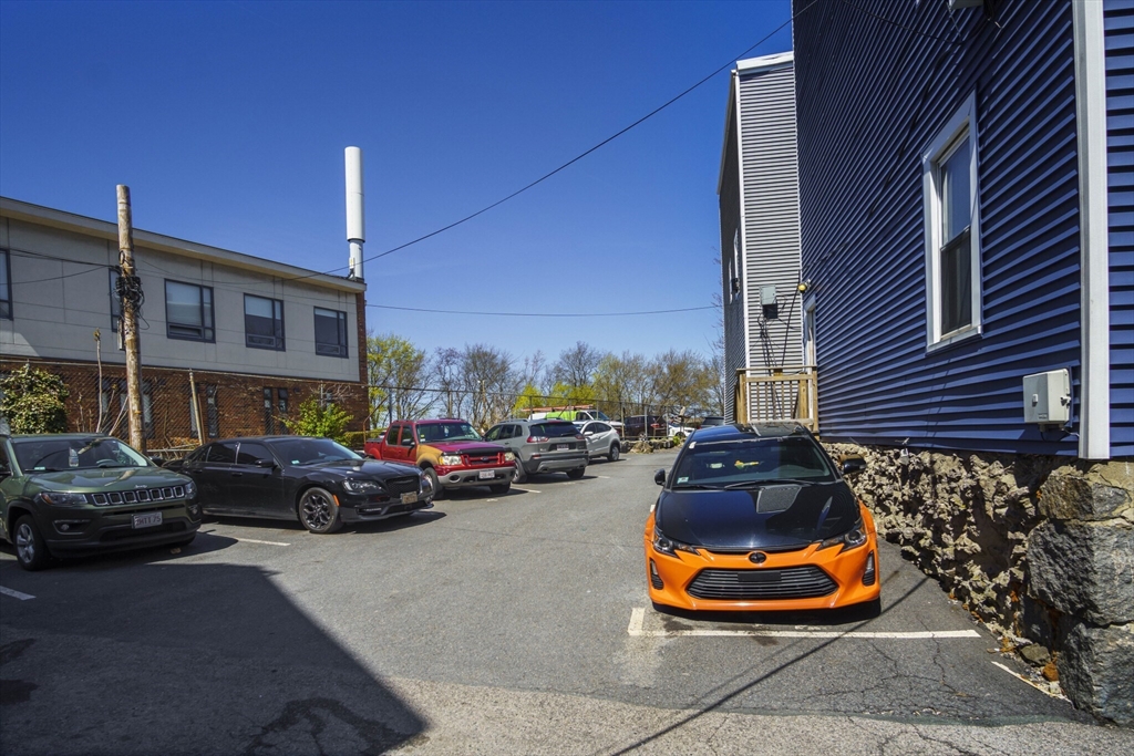 400-412 Neponset Avenue Boston, MA 02122 - Photo 13 of 31 a car parked in front of a building