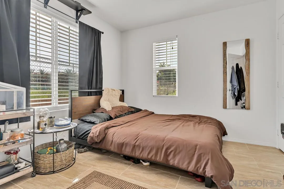 2840 Athens Road, Unit 10 Chula Vista, CA 91915 - Photo 11 of 35 a bedroom with double bed and a window