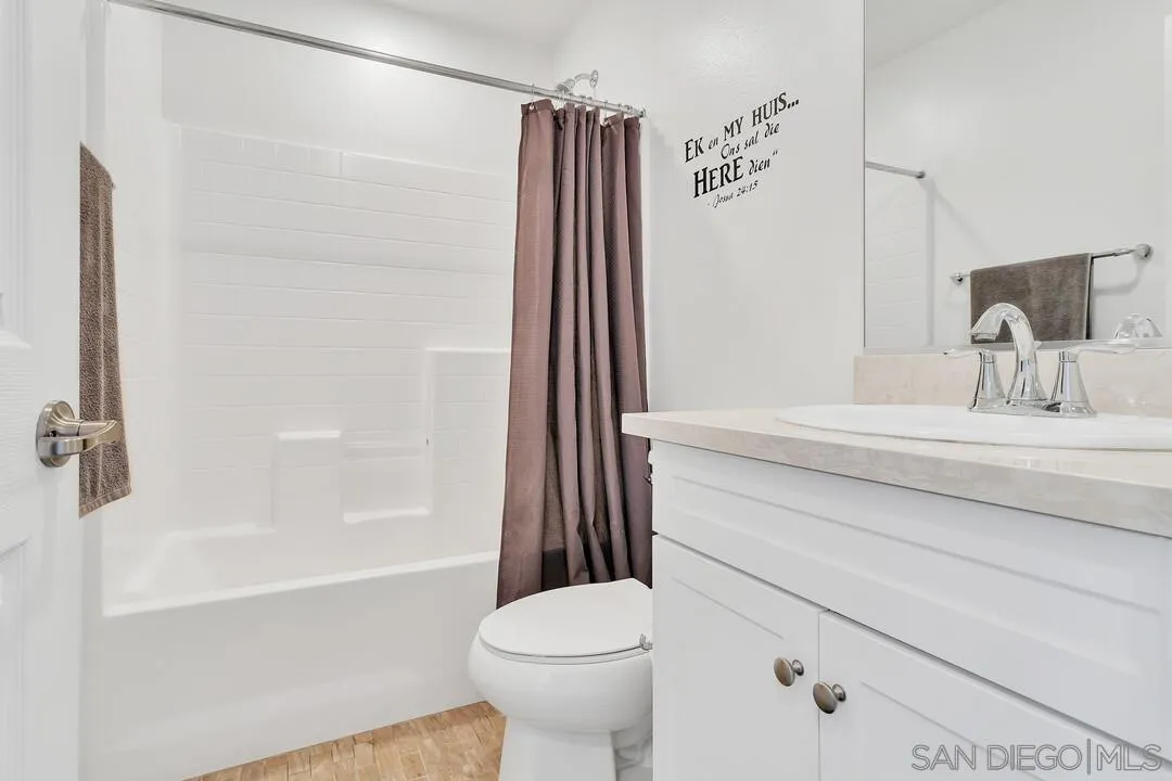 2840 Athens Road, Unit 10 Chula Vista, CA 91915 - Photo 20 of 35 a bathroom with a sink a toilet and shower