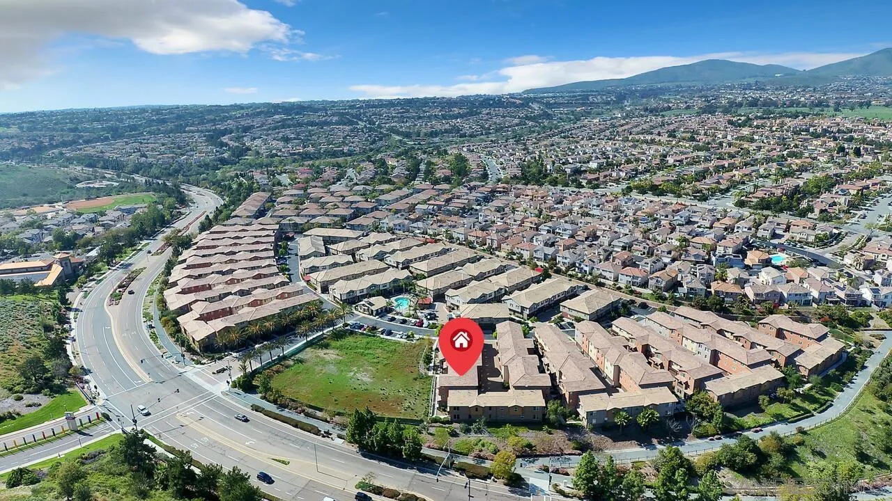 2840 Athens Road, Unit 10 Chula Vista, CA 91915 - Photo 31 of 35 an aerial view of residential houses with outdoor space and trees