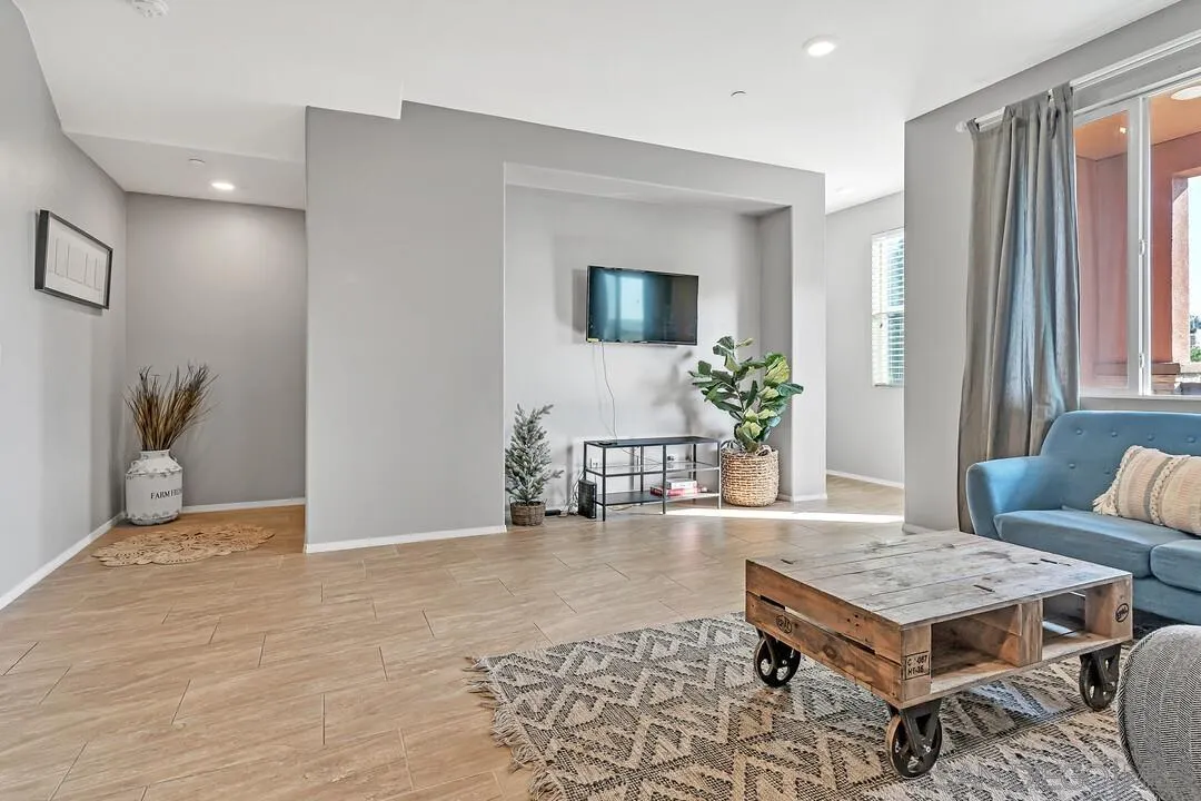 2840 Athens Road, Unit 10 Chula Vista, CA 91915 - Photo 9 of 35 a living room with furniture and wooden floor