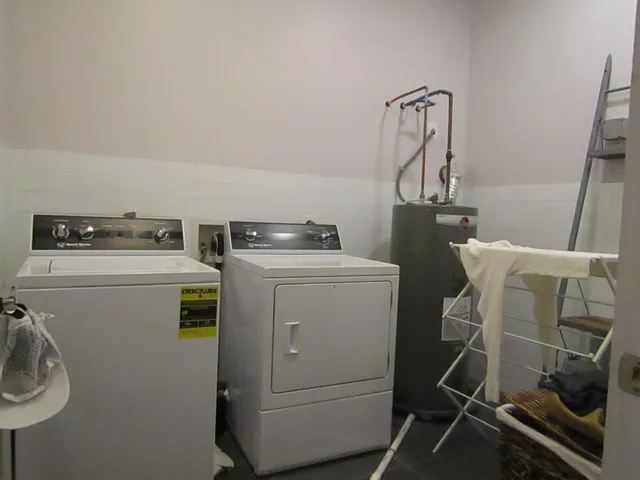 a utility room with dryer and washer