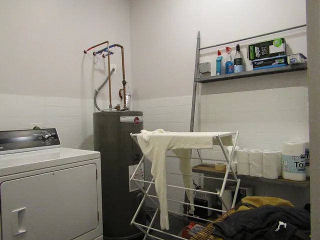 a utility room with dryer and washer