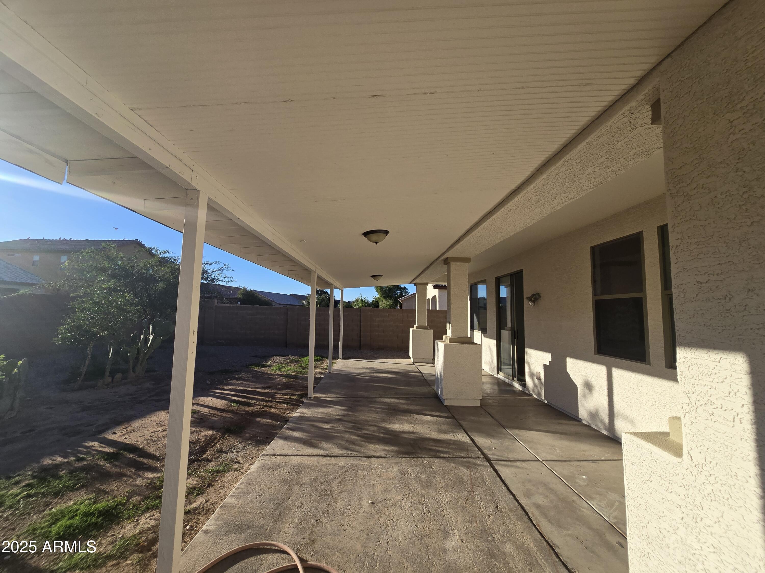18196 Calacera Street Maricopa, AZ 85138 - Photo 19 of 21 a view of a hallway with a glass door