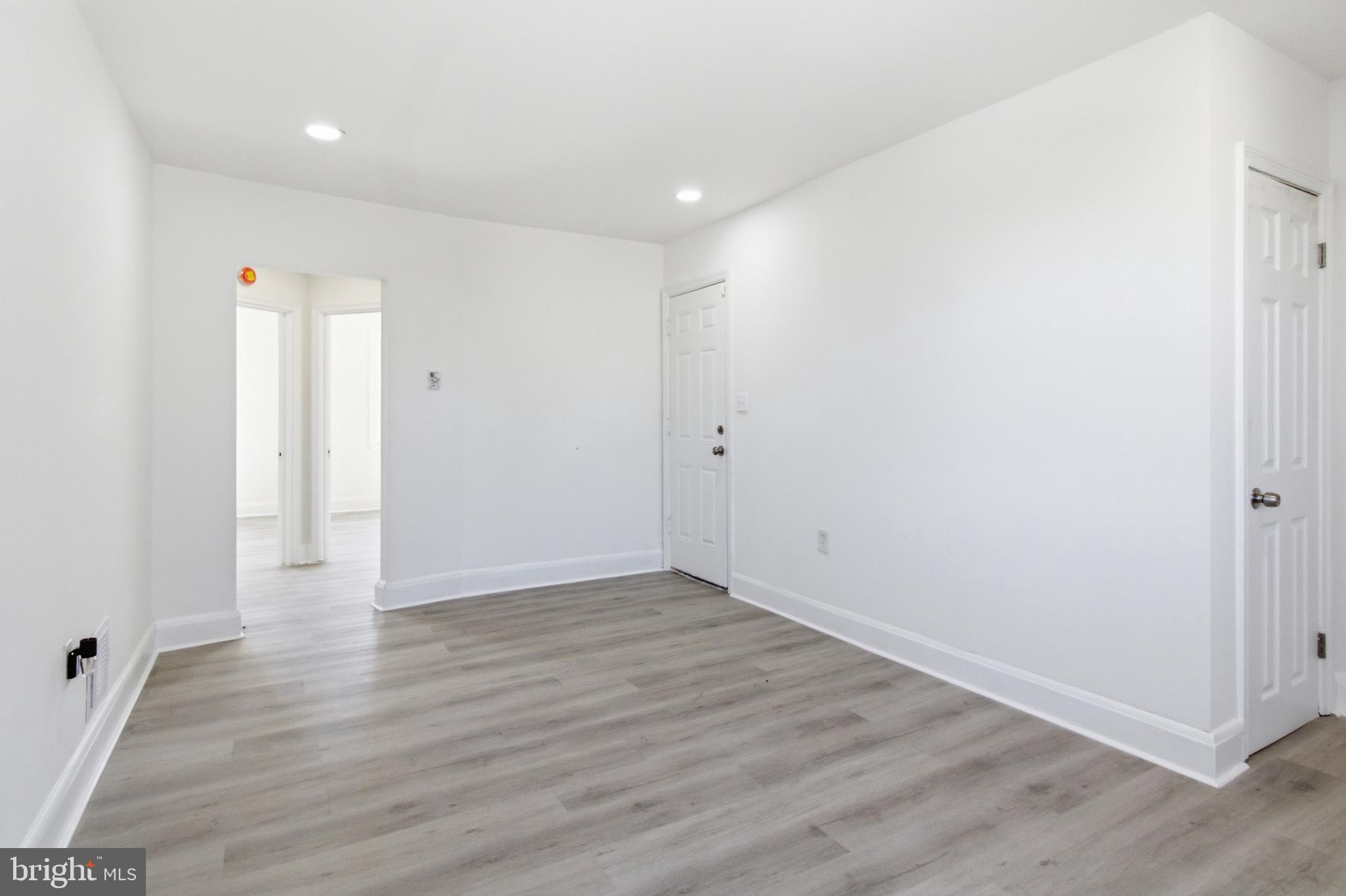 1509 Filbert Street Curtis Bay, MD 21226 - Photo 24 of 30 a view of an empty room with wooden floor