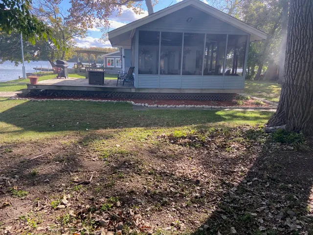 a view of a lake with sitting area