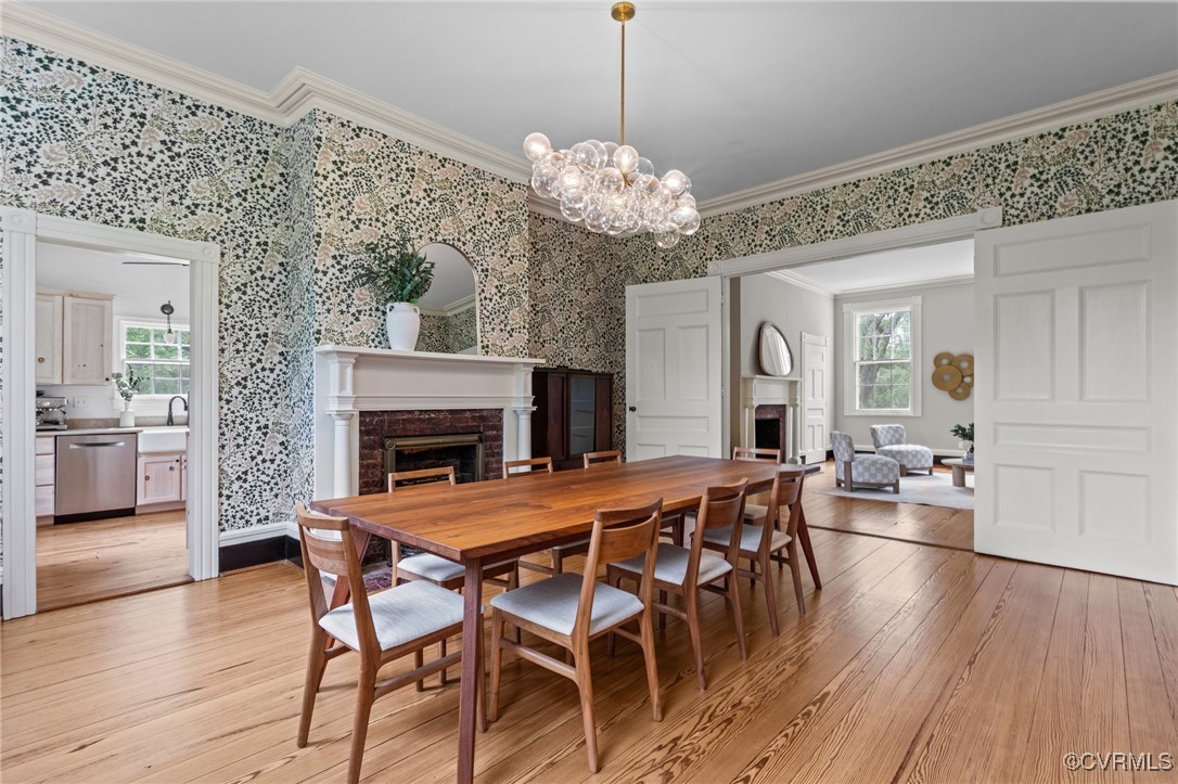 9341 Varina Road Henrico, VA 23231 - Photo 12 of 48 a view of a dining room with furniture and wooden floor