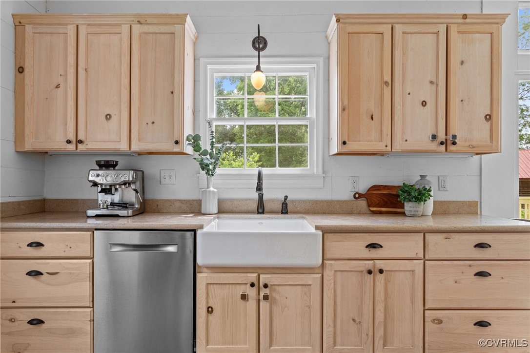 9341 Varina Road Henrico, VA 23231 - Photo 17 of 48 a kitchen with appliances cabinets and a window