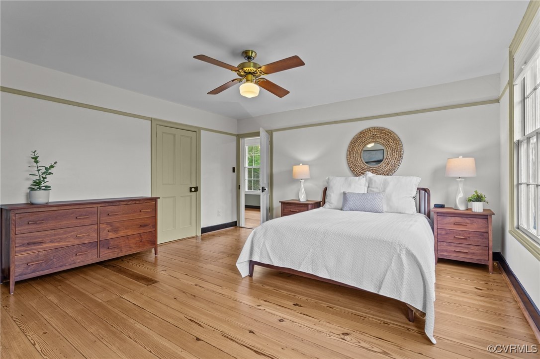 9341 Varina Road Henrico, VA 23231 - Photo 24 of 48 a bedroom with a bed and a chandelier