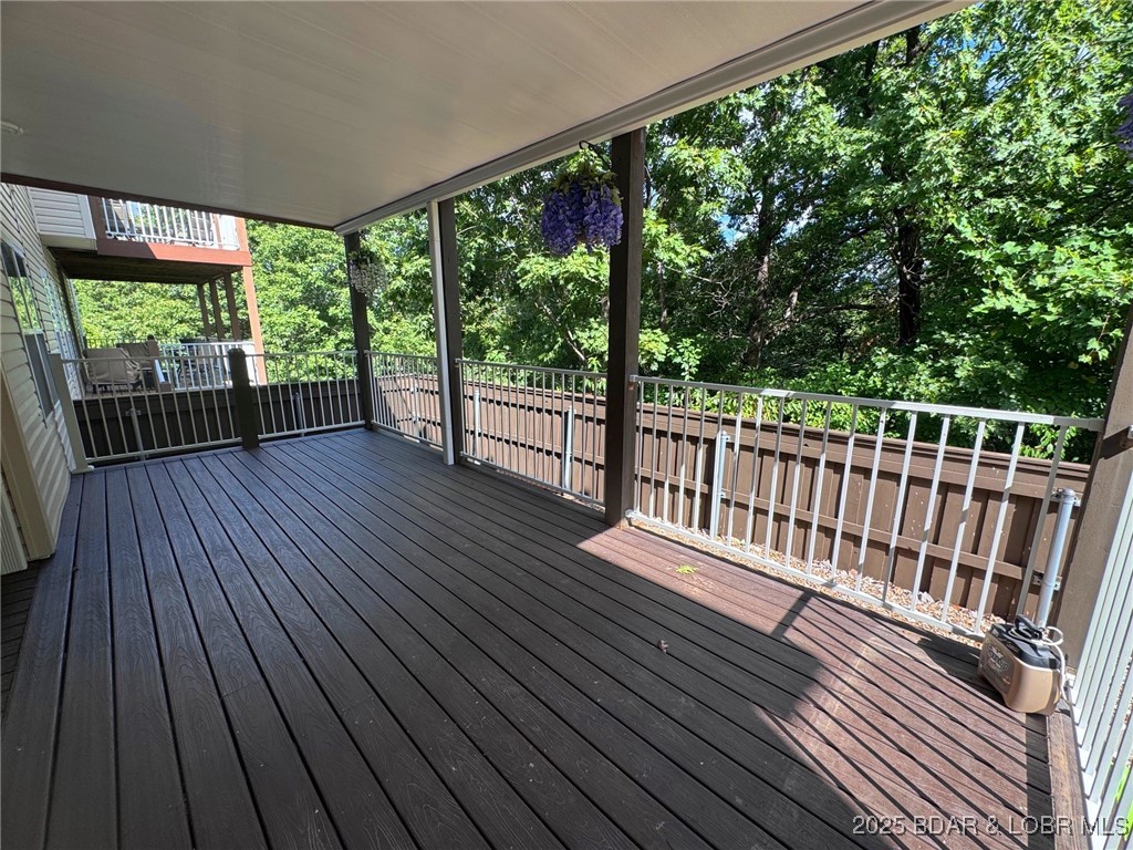 4331 Sunset Drive, Unit B Osage Beach, MO 65065 - Photo 21 of 36 Lower level covered deck