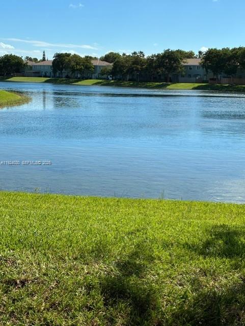 1692 Southeast 29th Court, Unit 206 Homestead, FL 33035 - Photo 10 of 15 a view of a lake