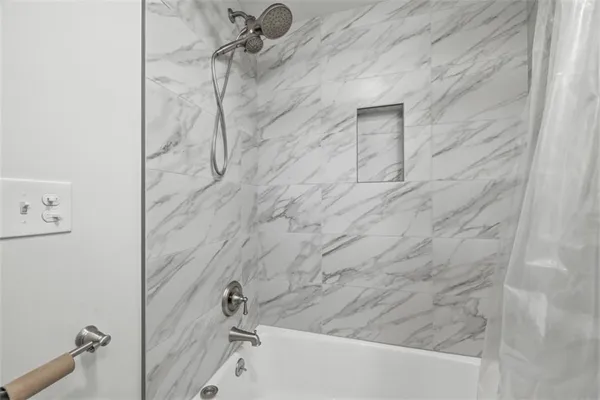 a bathroom with a bathtub