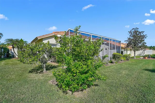 a house view with a backyard space