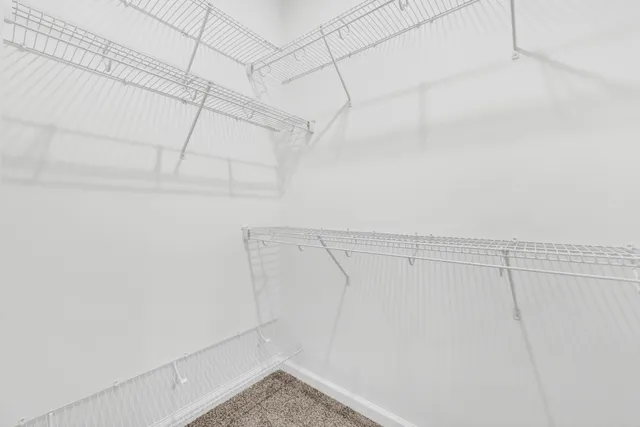 a view of a room with racks on the wall