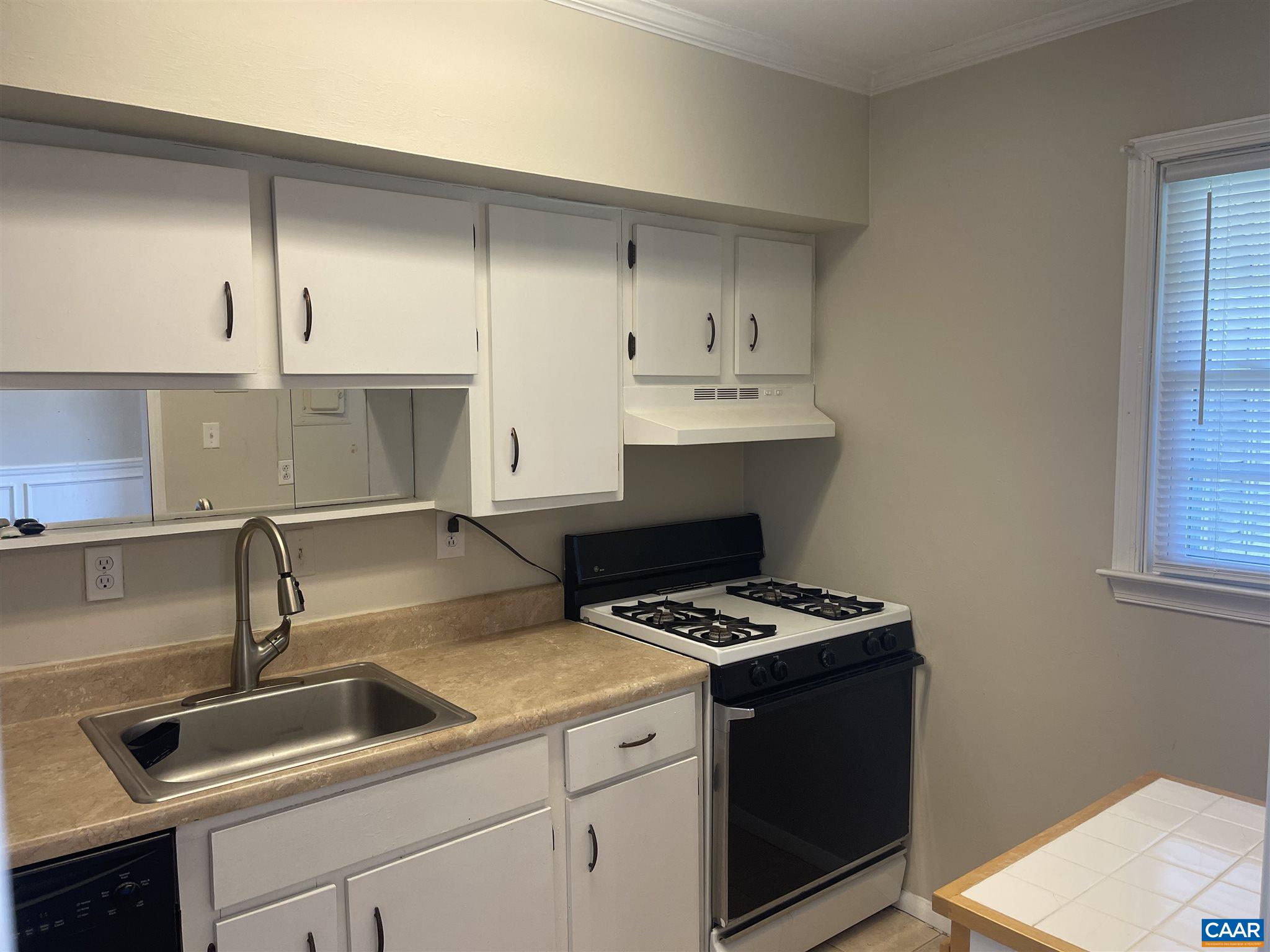 157 Hessian Hills Way, Unit 3 Charlottesville, VA 22901 - Photo 1 of 10 a kitchen that has a sink and a stove