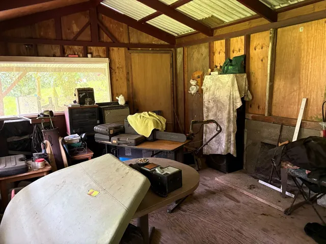 a room with furniture and a window