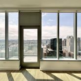 a view of a large window with a view of an outdoor space