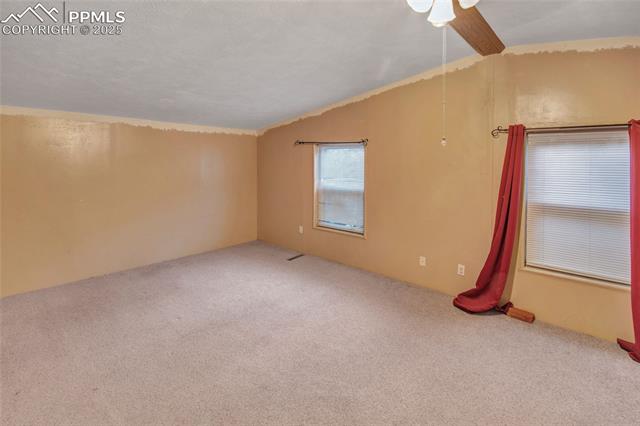 7940 Edison Road Yoder, CO 80864 - Photo 23 of 38 Carpeted spare room featuring ceiling fan