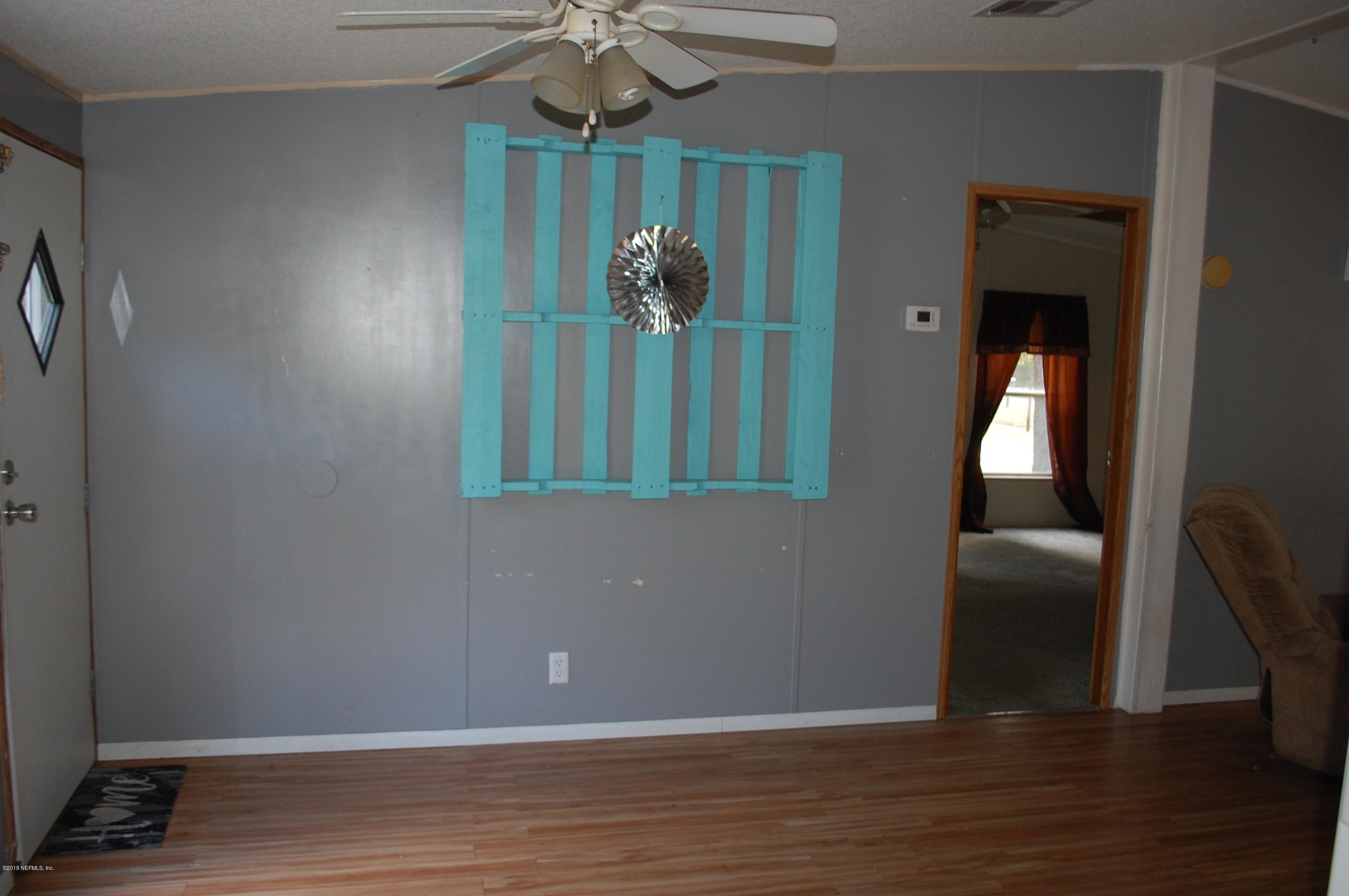 622 Lake Susan Road Hawthorne, FL 32640 - Photo 12 of 50 a view of entryway with wooden floor