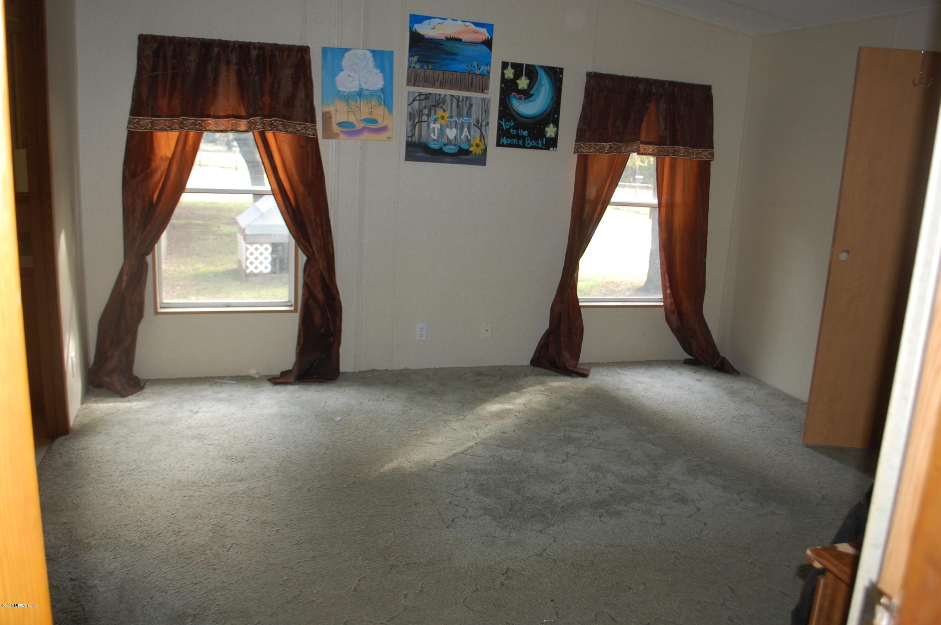 622 Lake Susan Road Hawthorne, FL 32640 - Photo 17 of 50 a view of empty room with front door