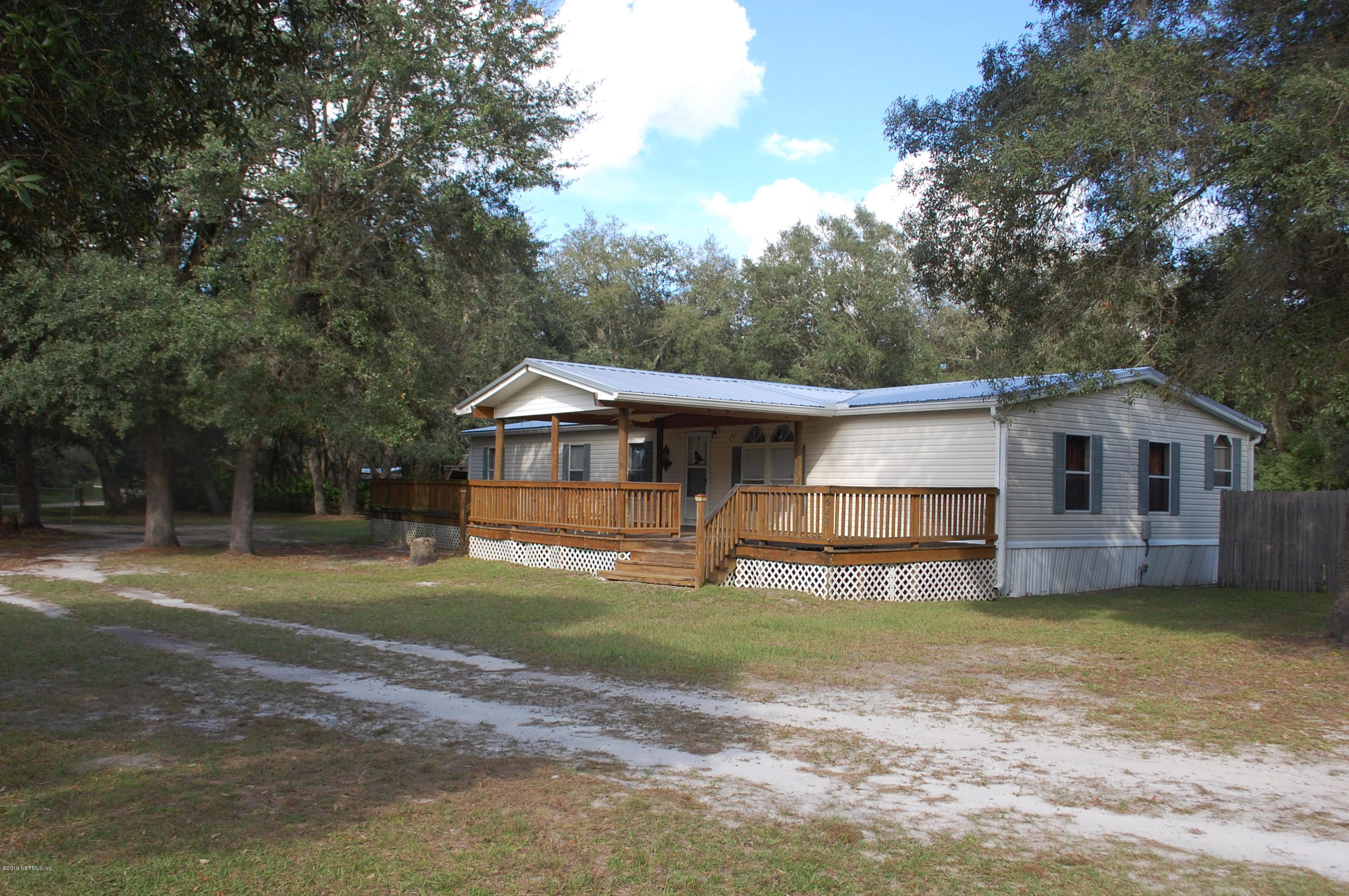 622 Lake Susan Road Hawthorne, FL 32640 - Photo 2 of 50 a view of a house with a yard