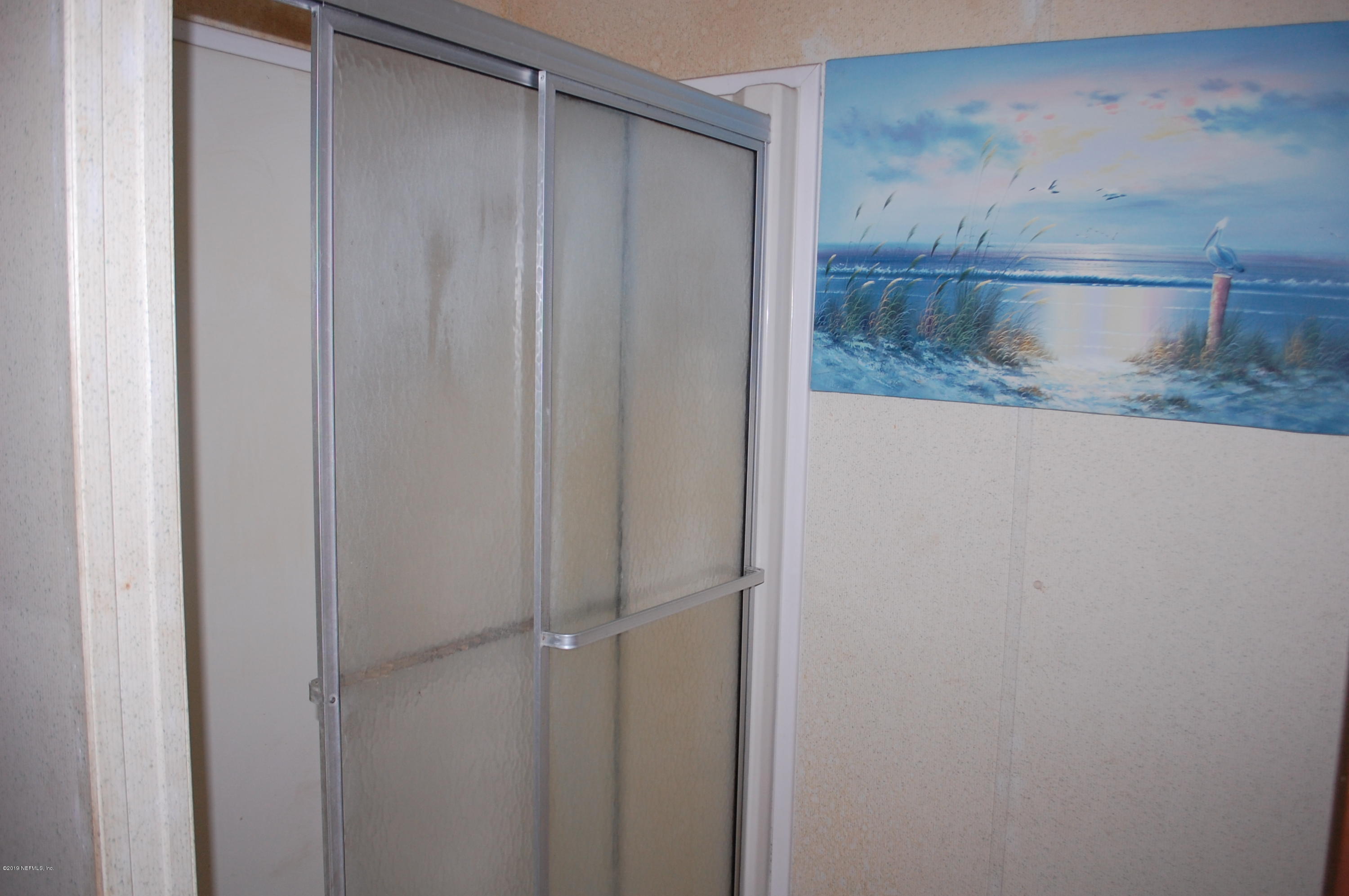 622 Lake Susan Road Hawthorne, FL 32640 - Photo 23 of 50 a view of wooden cabinets