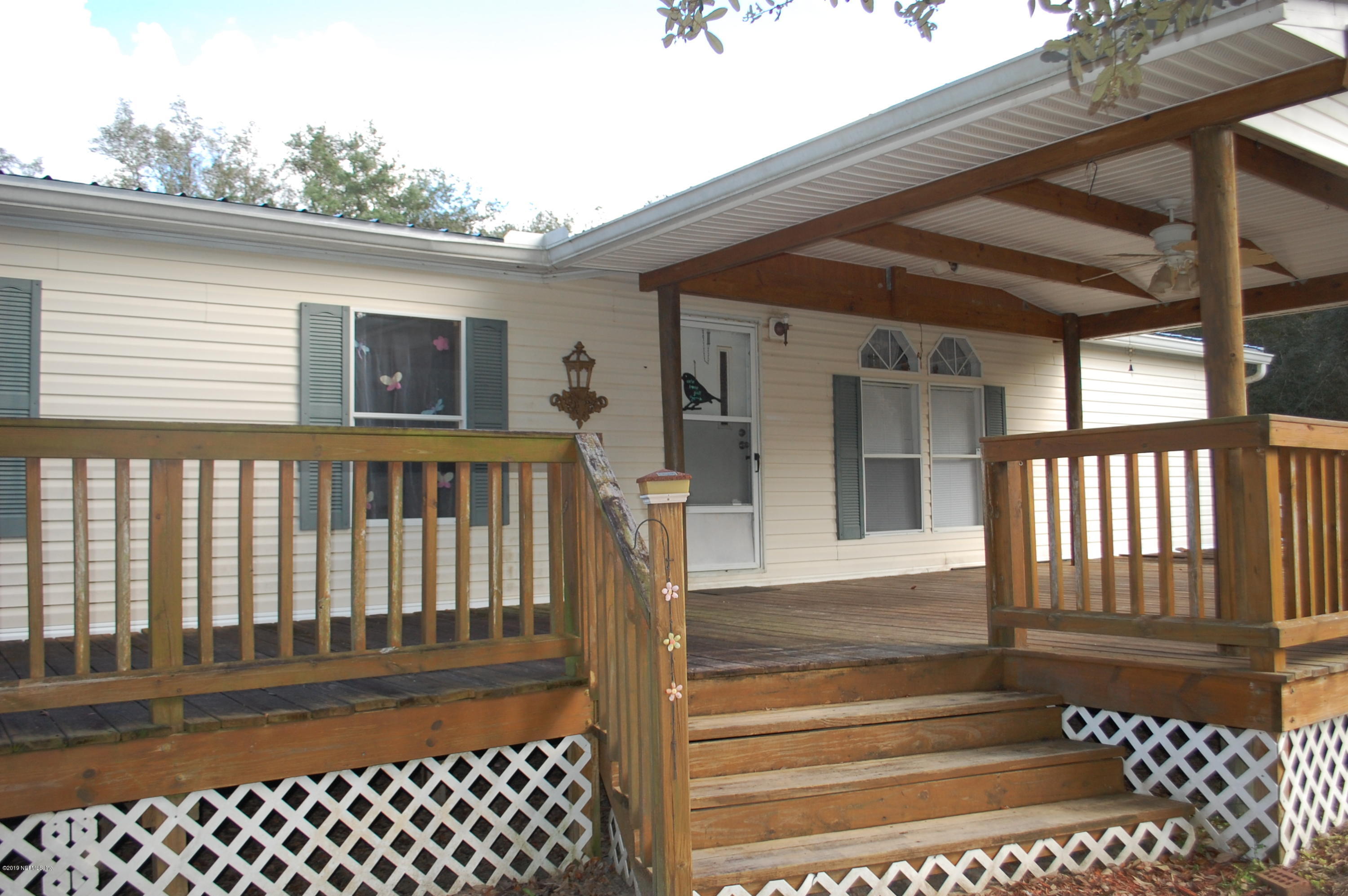622 Lake Susan Road Hawthorne, FL 32640 - Photo 3 of 50 a view of a entrance with stairs
