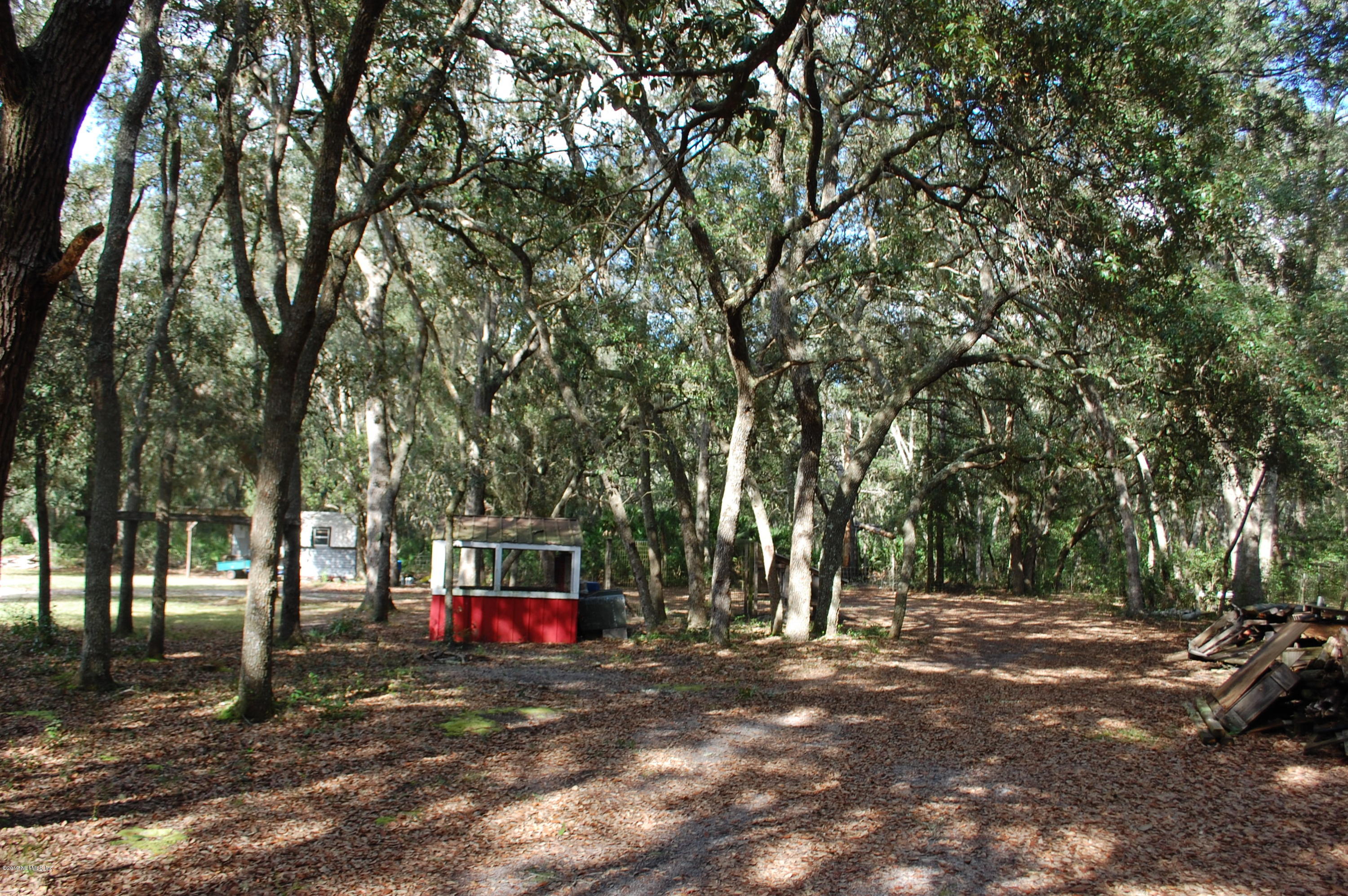 622 Lake Susan Road Hawthorne, FL 32640 - Photo 33 of 50 a view of a house with a yard
