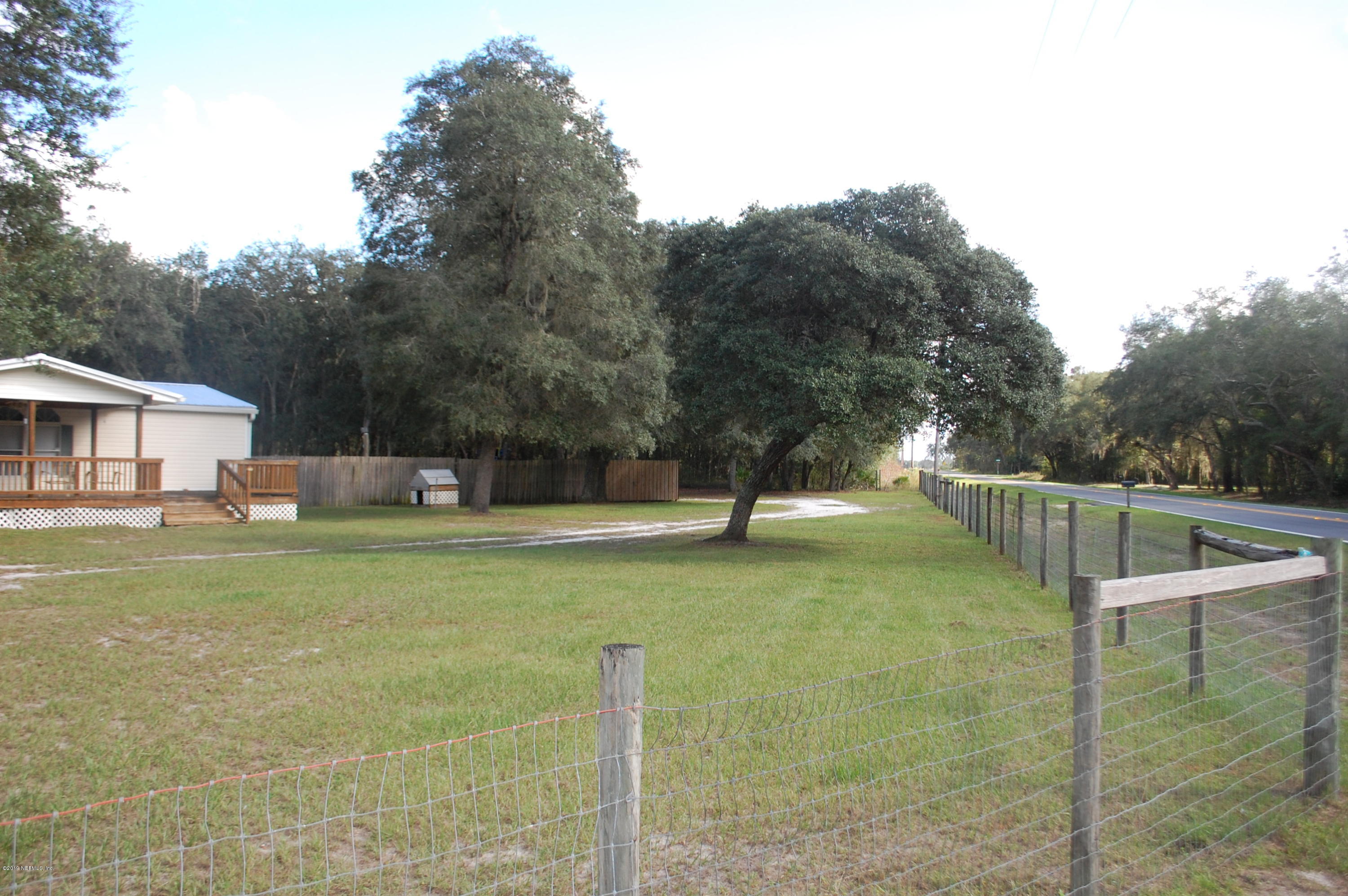 622 Lake Susan Road Hawthorne, FL 32640 - Photo 50 of 50 a view of a house with a yard