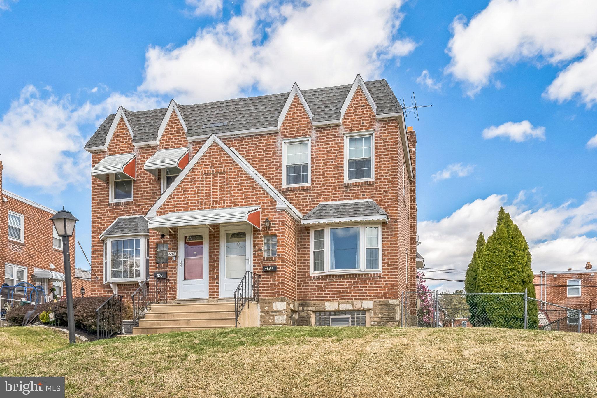 855 Medway Road Philadelphia, PA 19115 - Photo 1 of 30 a front view of a house with a yard