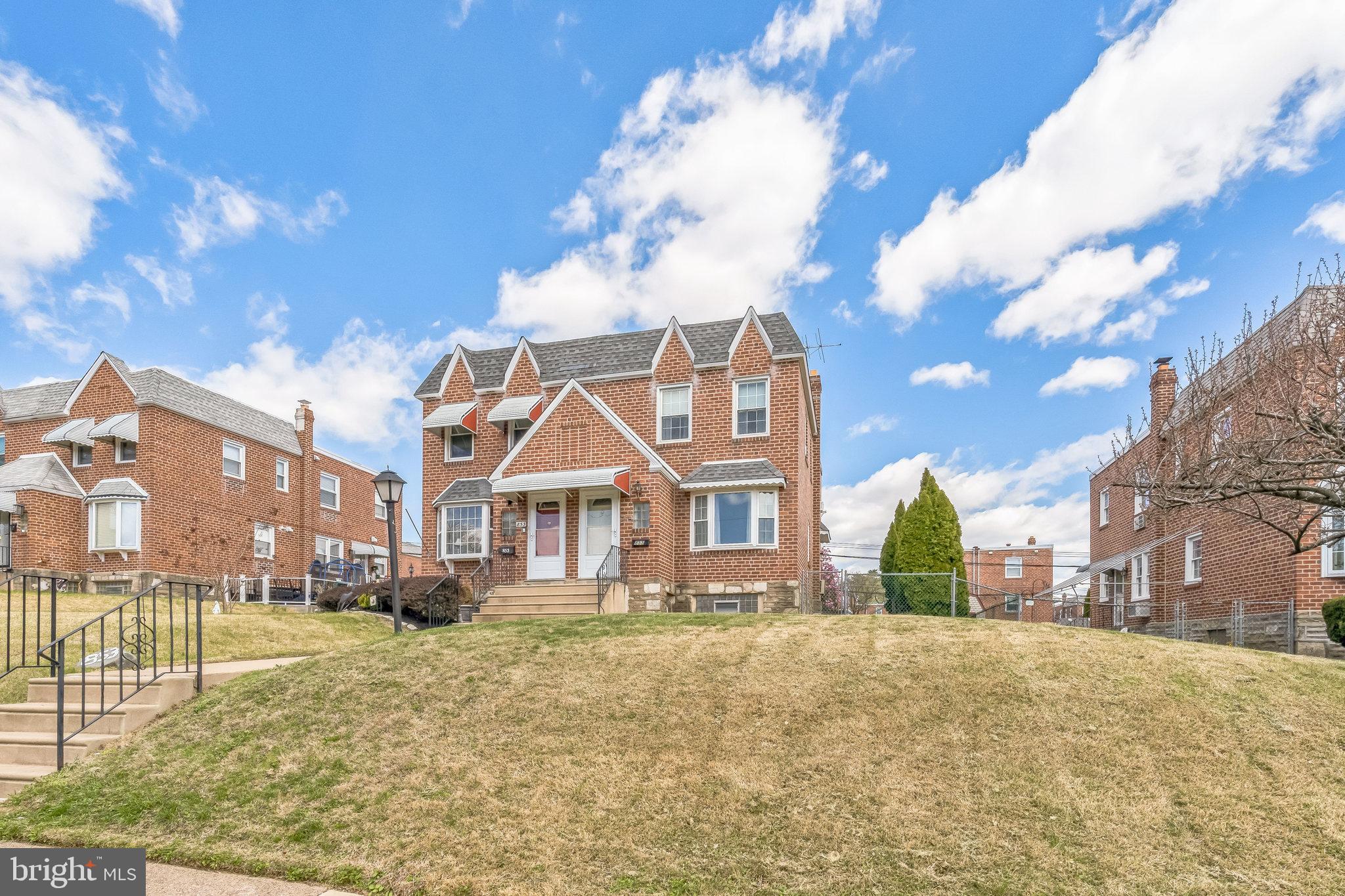 855 Medway Road Philadelphia, PA 19115 - Photo 20 of 30 a front view of a house with a garden