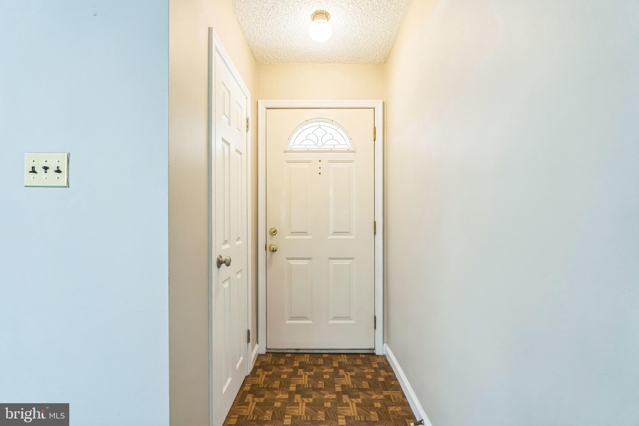 855 Medway Road Philadelphia, PA 19115 - Photo 2 of 30 a view of a hallway with wooden floor and closet