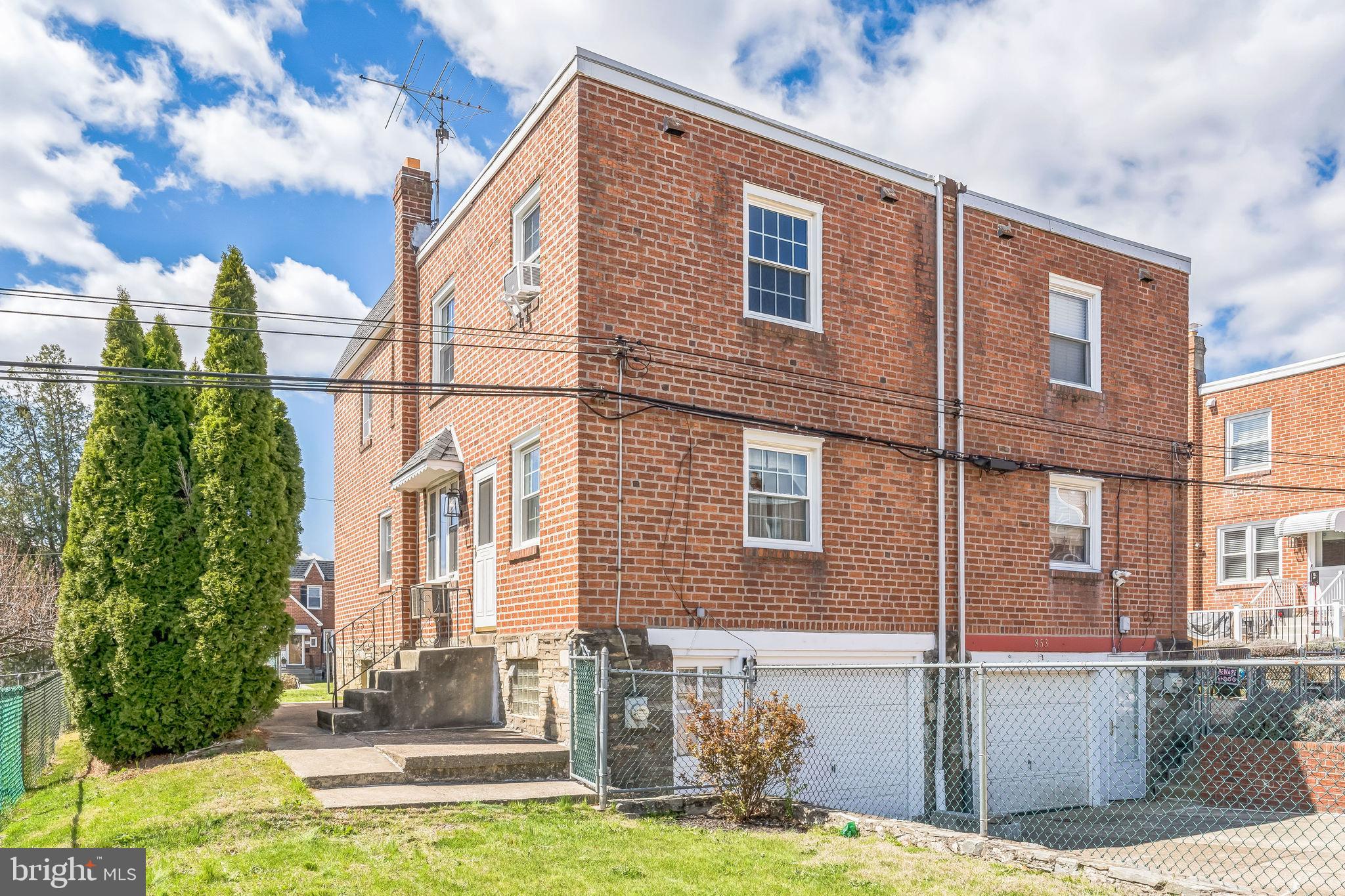 855 Medway Road Philadelphia, PA 19115 - Photo 29 of 30 a front view of a house with a yard