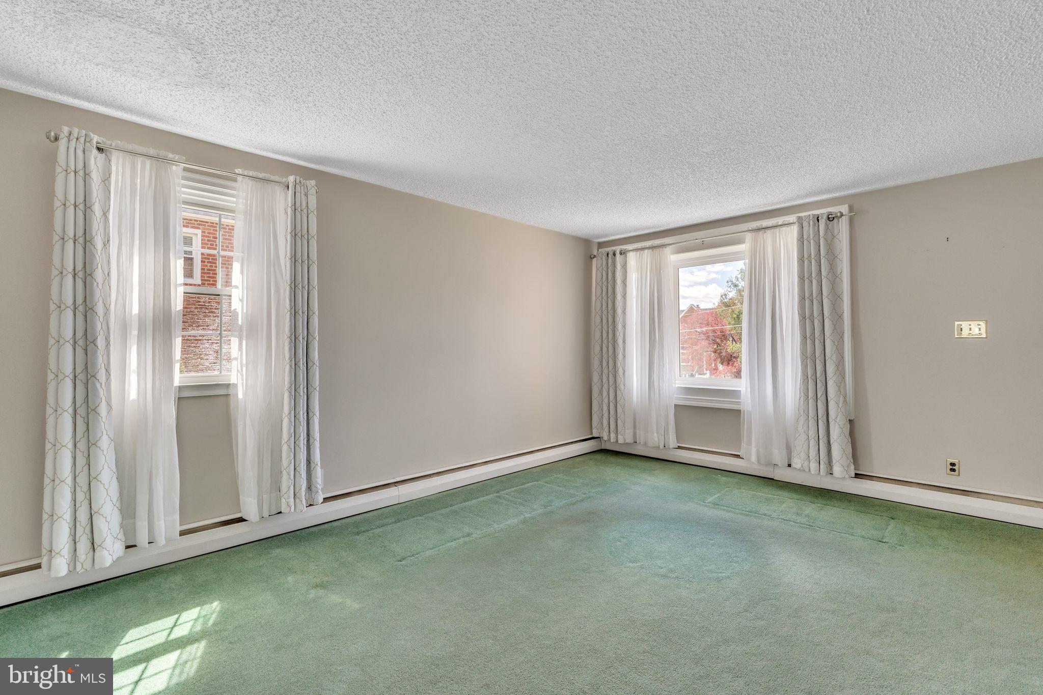 855 Medway Road Philadelphia, PA 19115 - Photo 5 of 30 an empty room with window