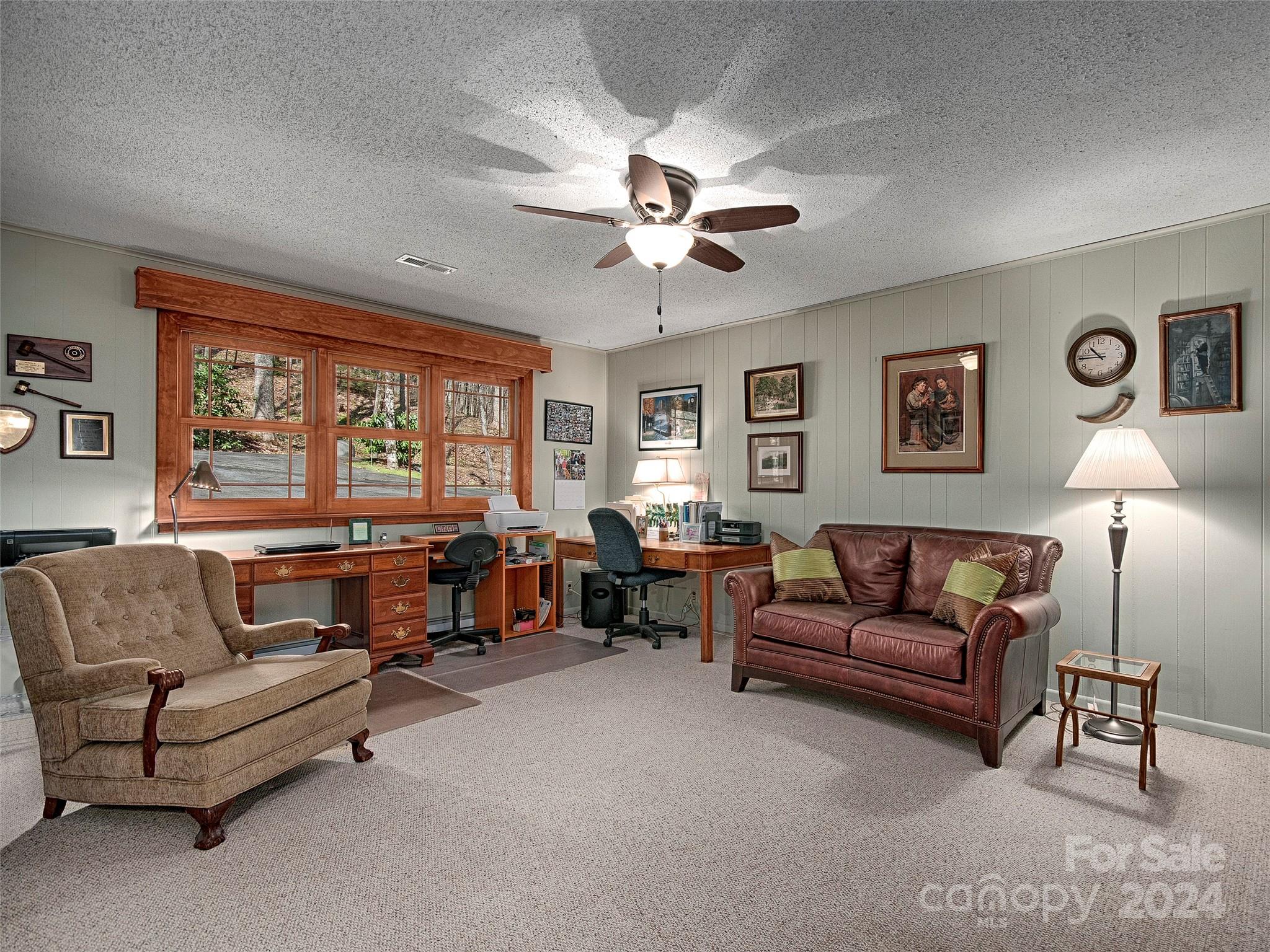 436 Old Fiddle Road Waynesville, NC 28786 - Photo 12 of 18 a living room with furniture and a large window