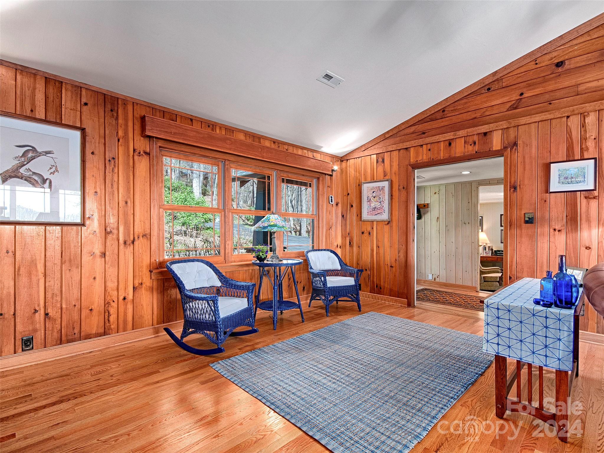436 Old Fiddle Road Waynesville, NC 28786 - Photo 5 of 18 a living room filled with furniture and wooden floor