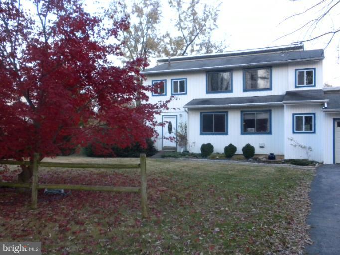 14409 Sturtevant Road Silver Spring, MD 20905 - Photo 1 of 30 a front view of a house with a yard