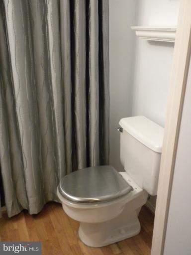 14409 Sturtevant Road Silver Spring, MD 20905 - Photo 20 of 30 a white toilet sitting next to a sink