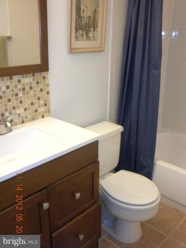 14409 Sturtevant Road Silver Spring, MD 20905 - Photo 27 of 30 a bathroom with a sink and a toilet
