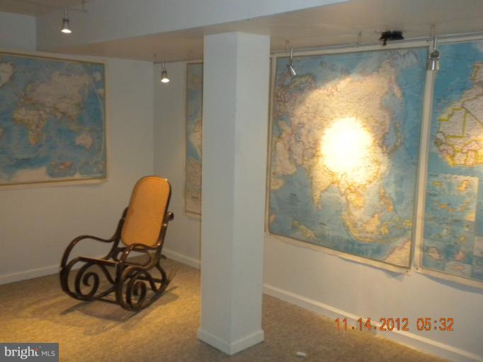 14409 Sturtevant Road Silver Spring, MD 20905 - Photo 30 of 30 a view of a door and chair in a room