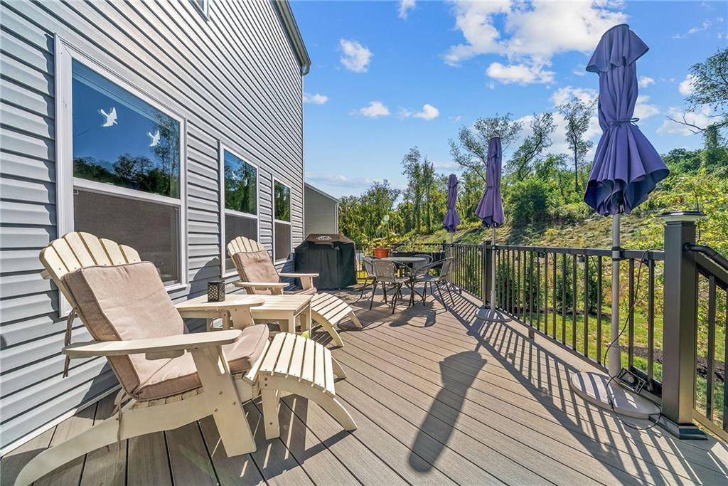 264 Lily Ridge Drive Canonsburg, PA 15317 - Photo 47 of 50 a view of a patio with table and chairs and potted plants